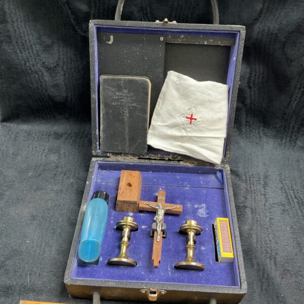 Vintage military field altar set with religious items.