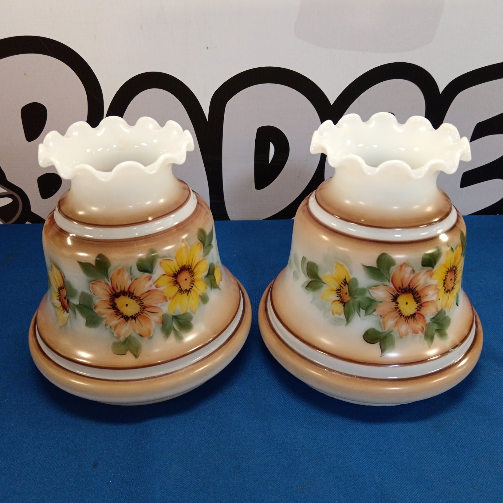 Vintage milk glass bell lamp shades with floral painting.