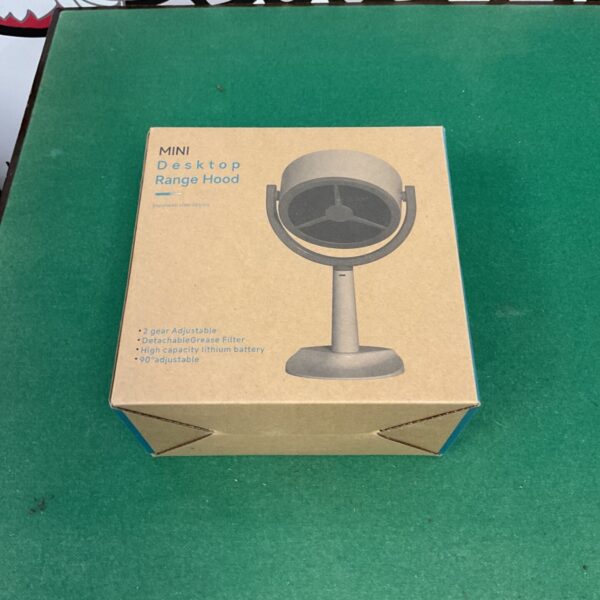 Vintage mini desktop range hood for cooling food.