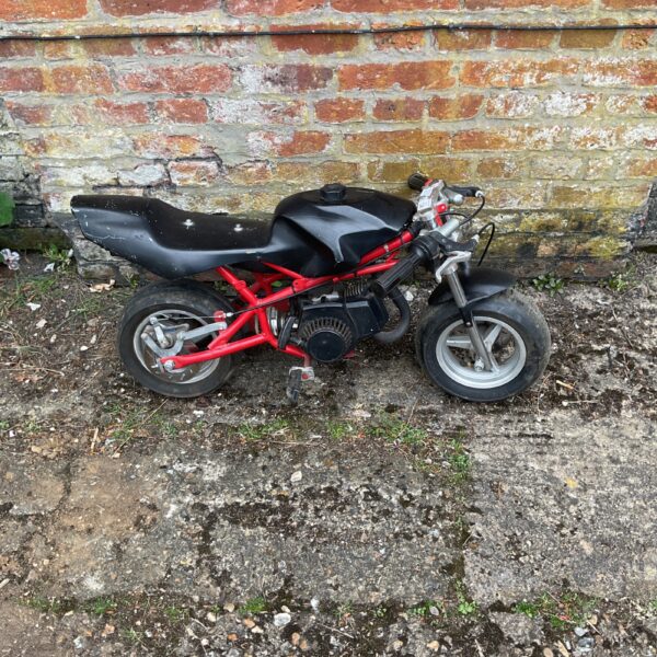 Used mini motorbike with 49cc petrol engine for sale.