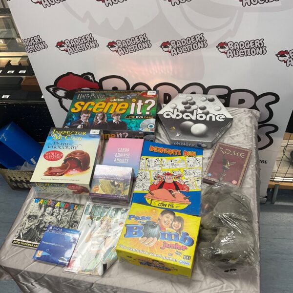 Mixed lot of board games including Harry Potter Scene It? and Pass the Bomb.