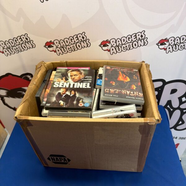 Mixed DVD collection in a cardboard box, assorted film lot.
