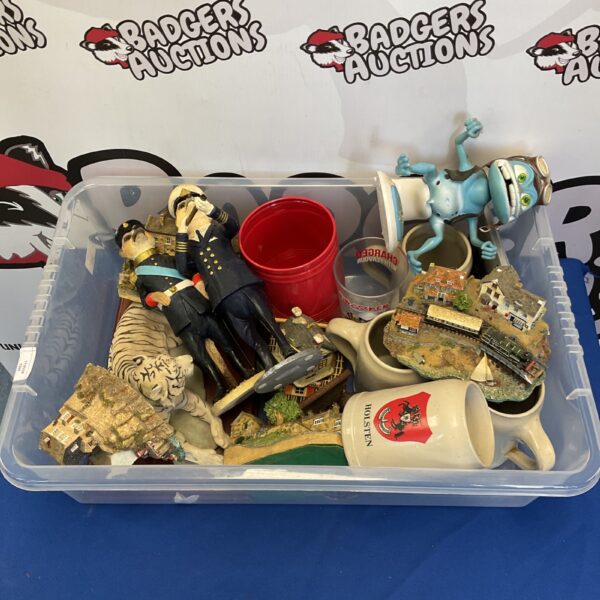 Mixed lot of German beer steins and meerkat figurines for collectors.