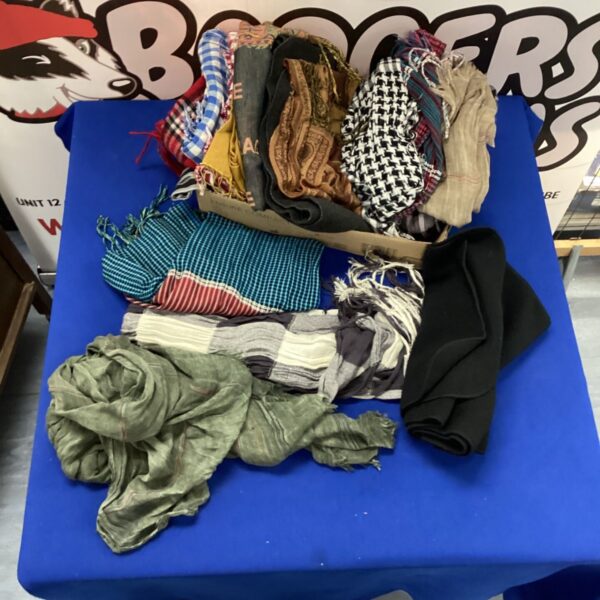 Mixed lot of colourful patterned scarves for women's fashion.