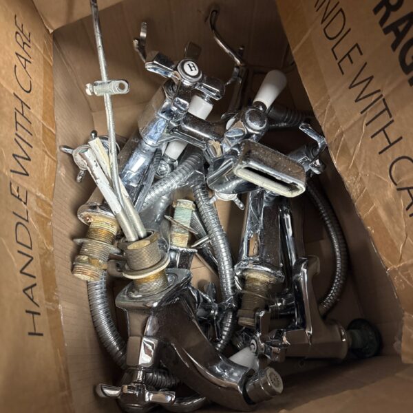 Used mixer taps lot for plumbing and restoration projects.