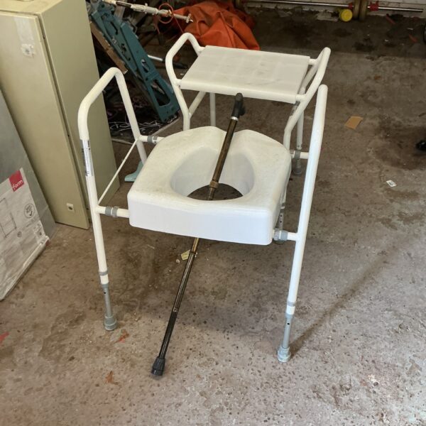 Used mobility toilet riser with metal frame and plastic seat.