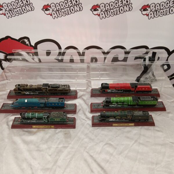 Vintage model train collection featuring LMS Duchess locomotive.
