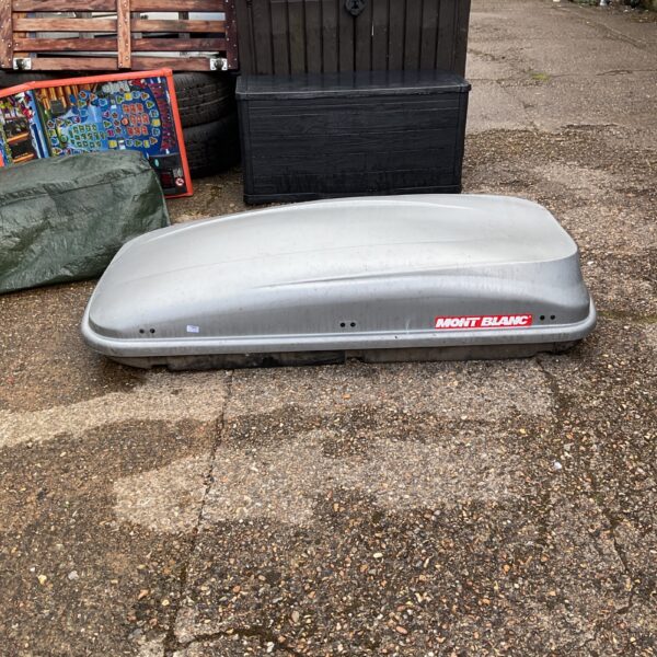 Grey Mont Blanc car roof box for vehicle storage.