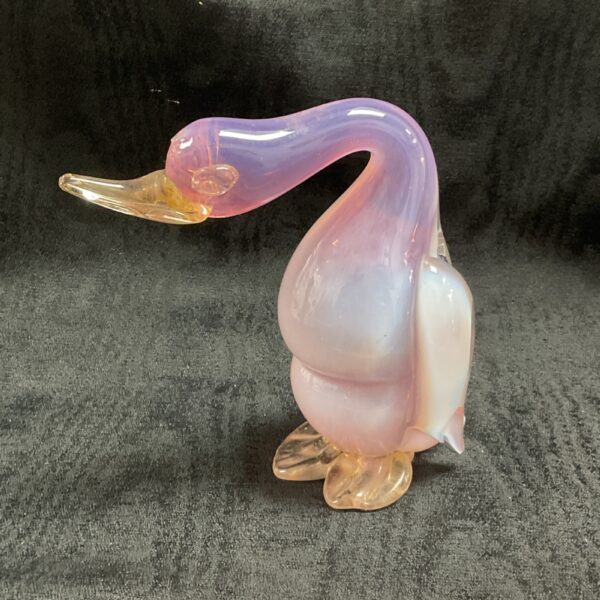 Pink alabastro Murano glass bird sculpture in a dynamic pose.