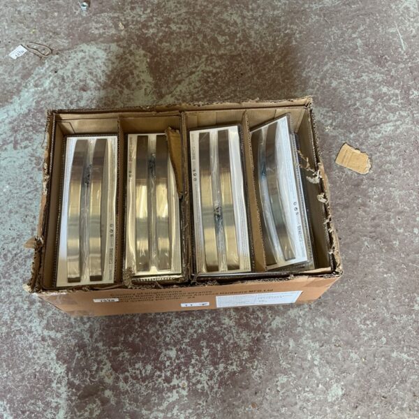 Box of vintage nickel coloured door handles.