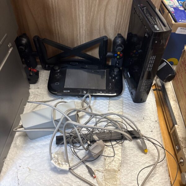 Nintendo Wii U console with GamePad and power supply.