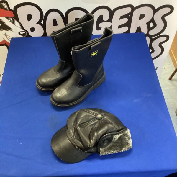 Black Northwest Territory leather boots and winter cap set.
