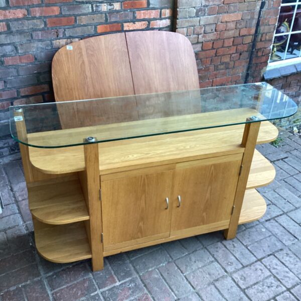Vintage oak side cabinet with glass top for display and storage.