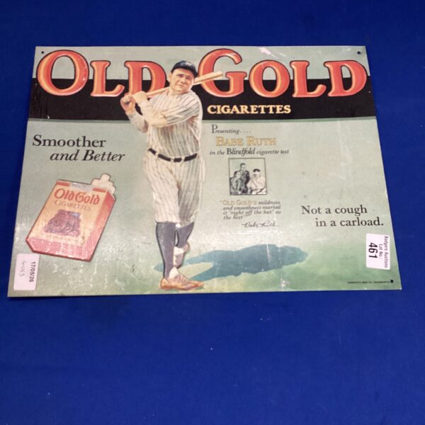 Vintage Old Gold Cigarettes sign featuring Babe Ruth advertising.