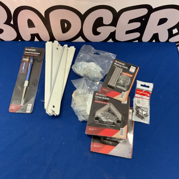 Parkside DIY hardware lot including corner braces and tool sharpener.