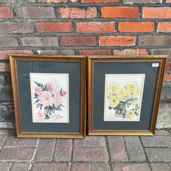 Pair of Patricia Emery flower prints in gilt frames.