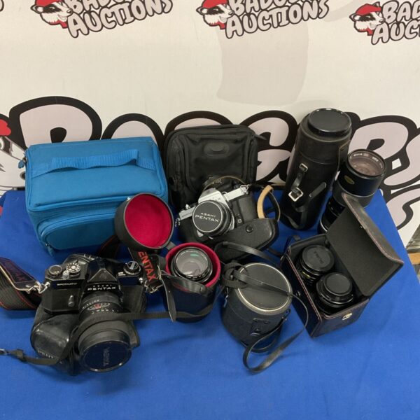 Vintage Pentax Spotmatic camera lot with lenses and case.