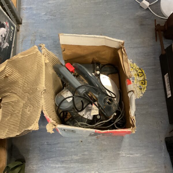 Used Performance Power compound mitre saw in a cardboard box.