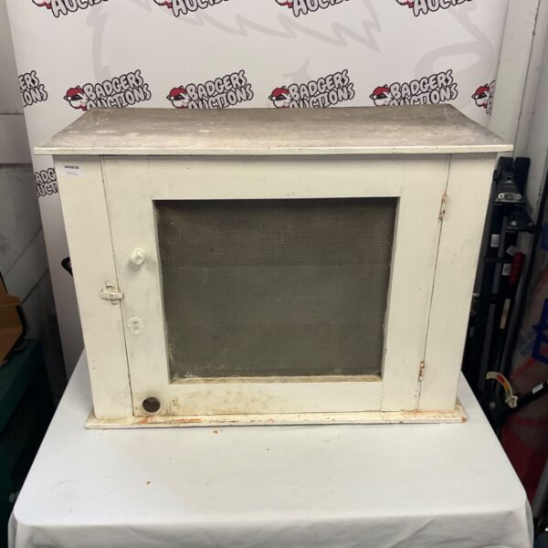 Wire pet hutch with a door catch for small animals.