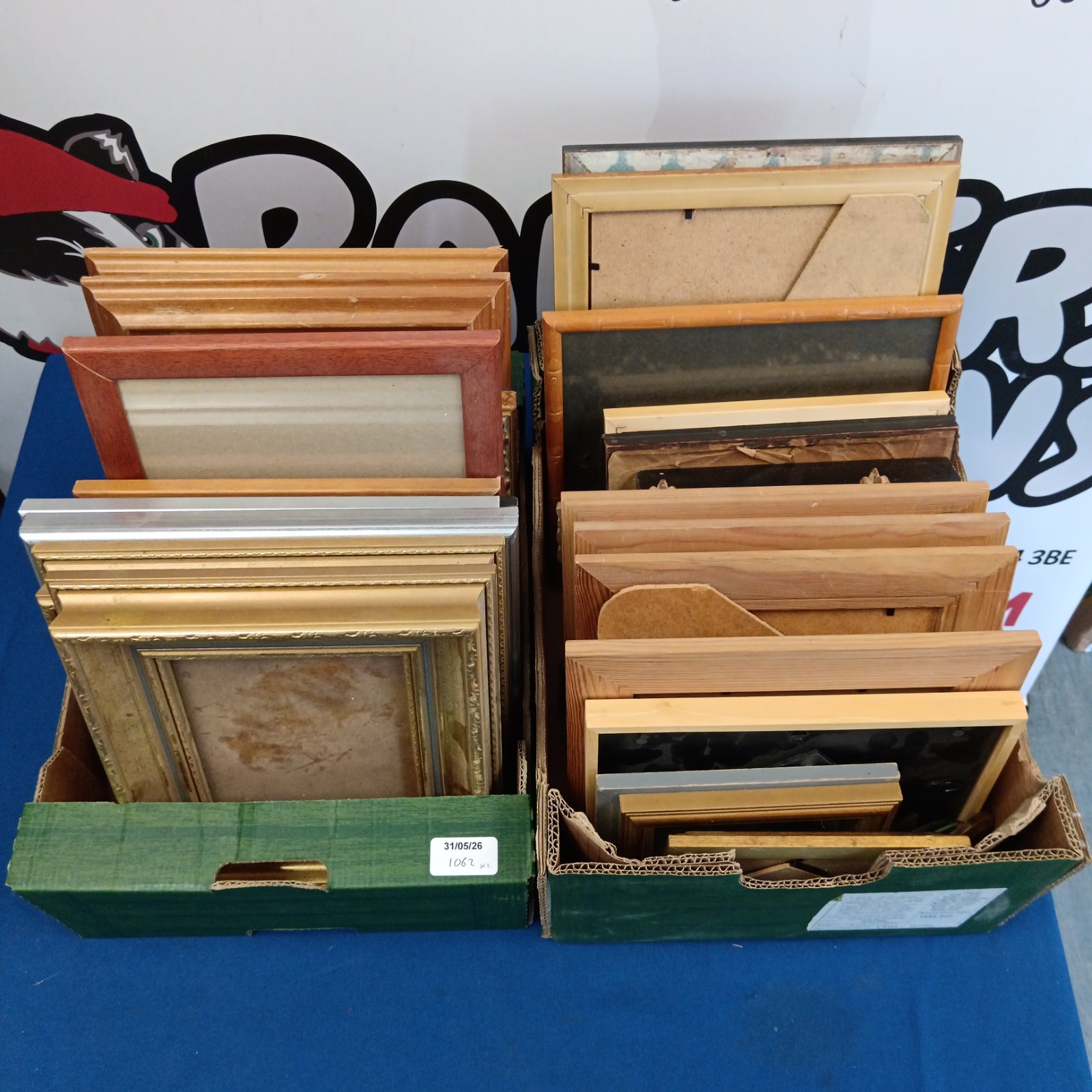 Assorted vintage and wooden photo frames in a lot.