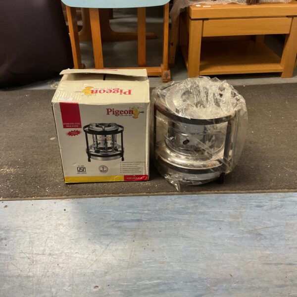 Vintage Pigeon kerosene wick stove in used condition.