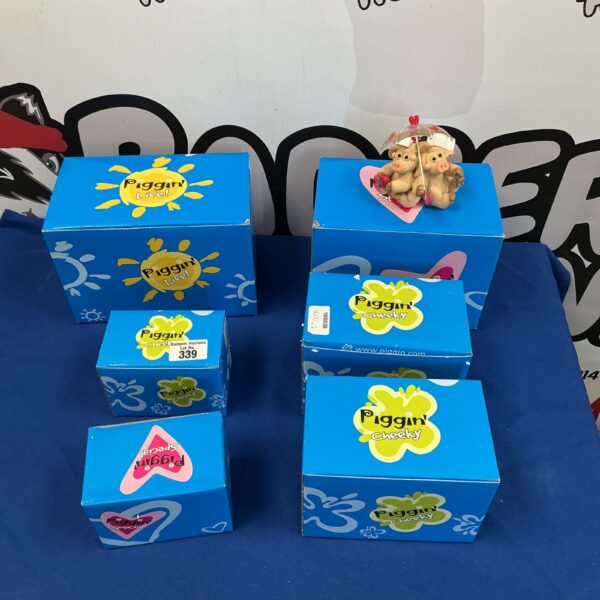 Six boxed Piggin Cheeky ornaments for collectors.