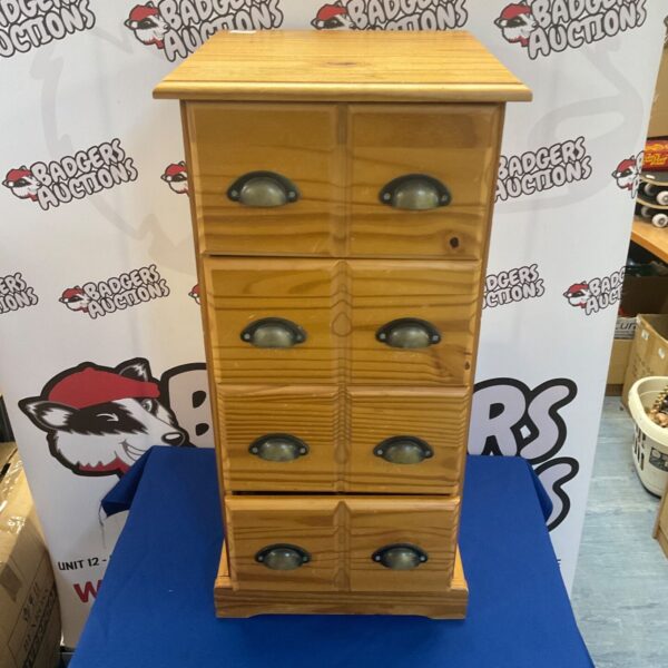 Vintage pine 8-drawer chest of drawers for bedroom storage.