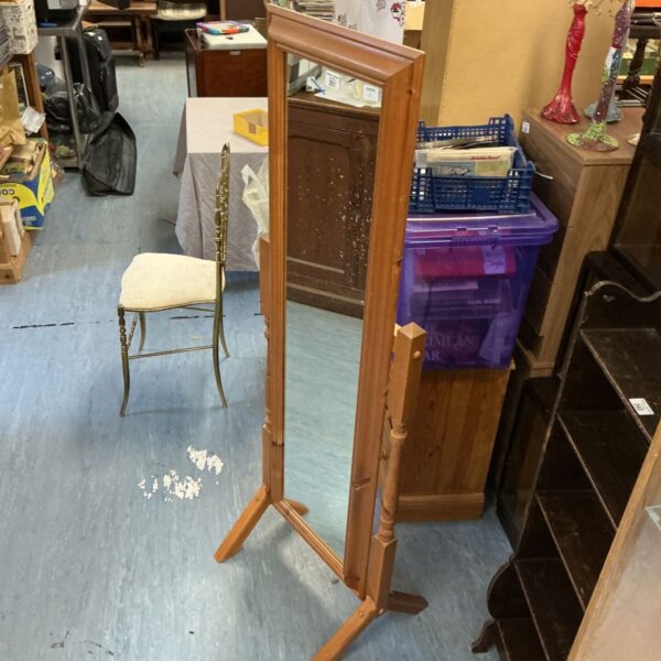 Vintage pine framed full length mirror with angled supports.