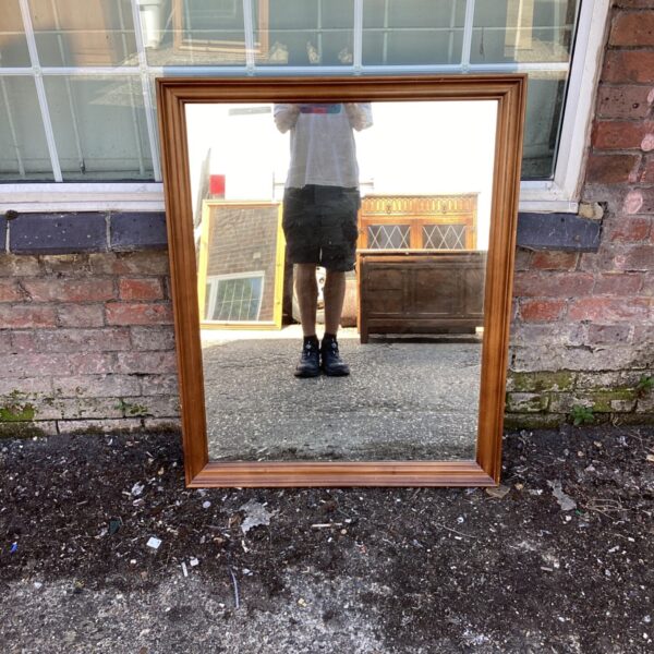 Vintage pine framed rectangular mirror for rustic home decor.