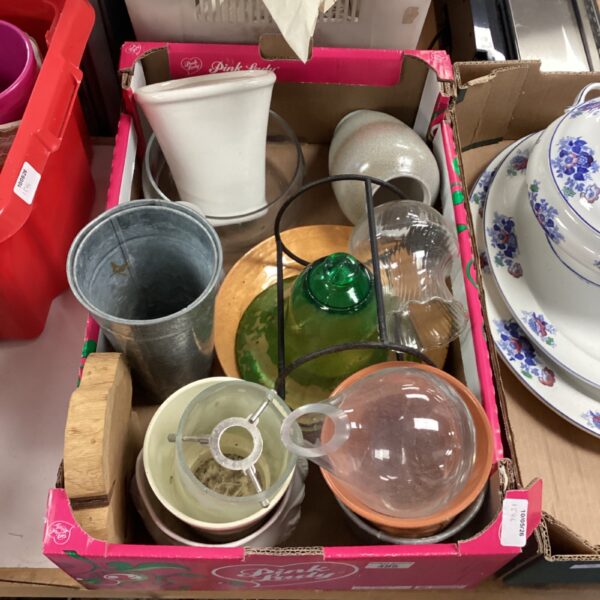 Mixed lot of terracotta, ceramic, and metal plant pots for gardening.