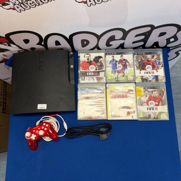 PlayStation 3 console bundle with games and Rock Candy controller.