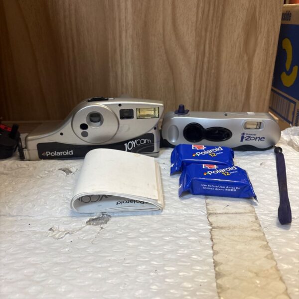 Vintage Polaroid JoyCam camera with Eye-Zone attachment for instant photography.