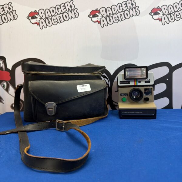 Vintage Polaroid Land Camera 1500 with case and flash.