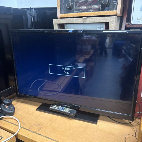 Used Polaroid LED television with remote control for home entertainment.