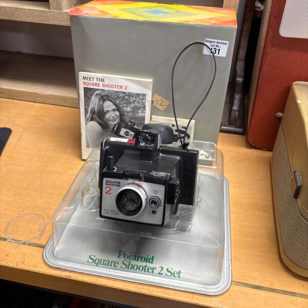 Vintage Polaroid Square Shooter 2 camera in its original box.