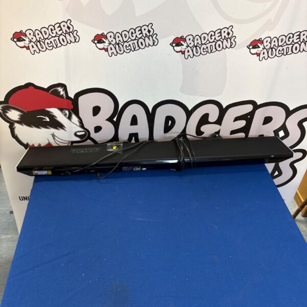Black Polaroid TB356 sound bar with remote control.