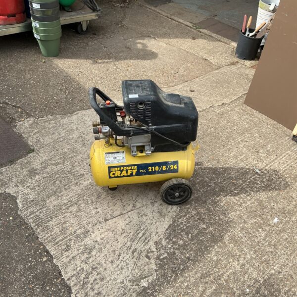 Portable Power Craft air compressor for workshop and DIY tasks.