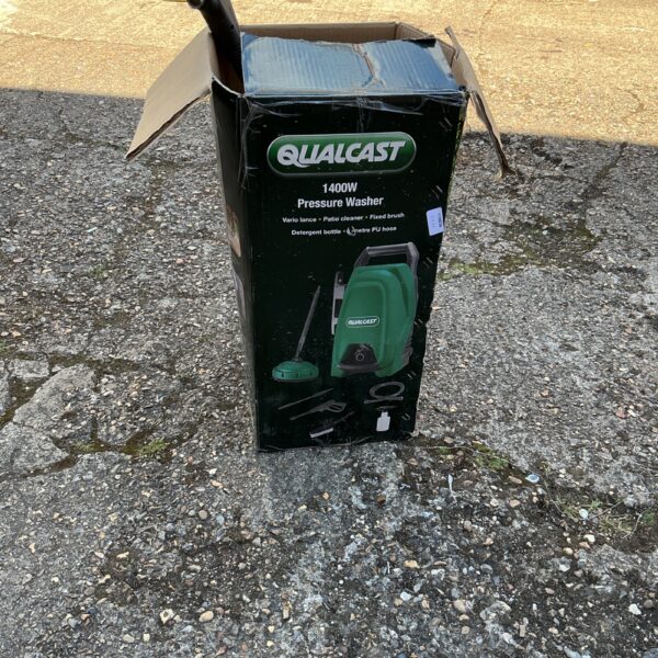 Qualcast 1400W power washer in original packaging with attachments visible.