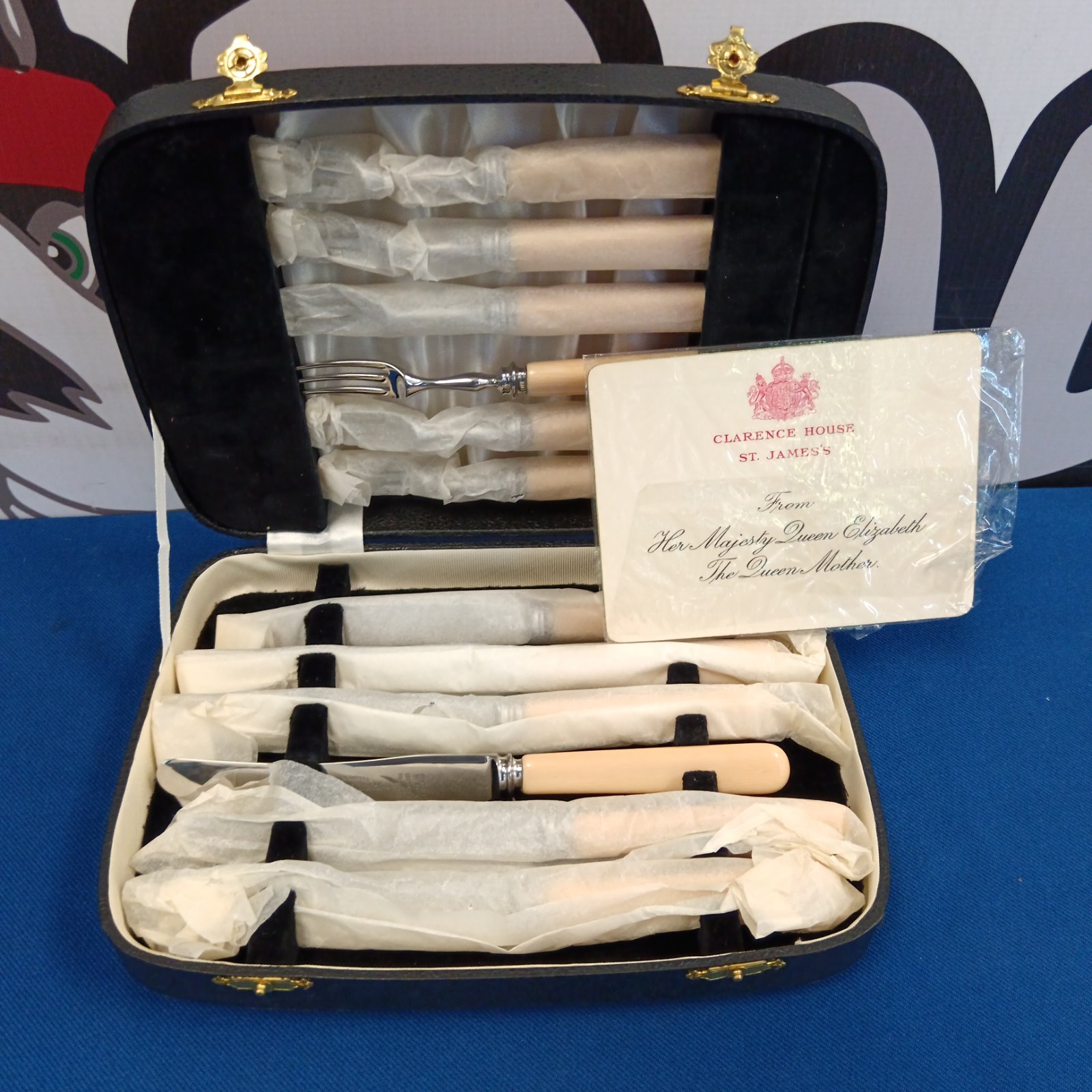 Queen Mother knife and fork set by Thomas Ward & Sons in velvet case.