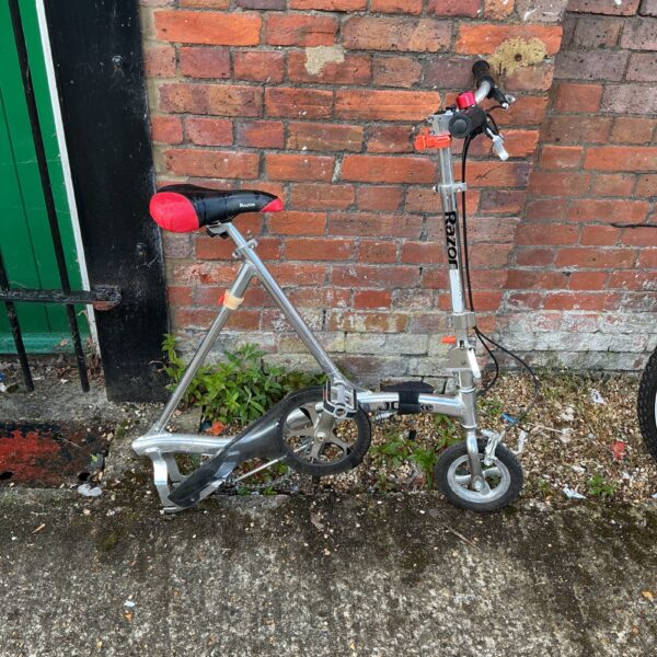 Vintage Razor Town folding bicycle presented for repair and restoration.