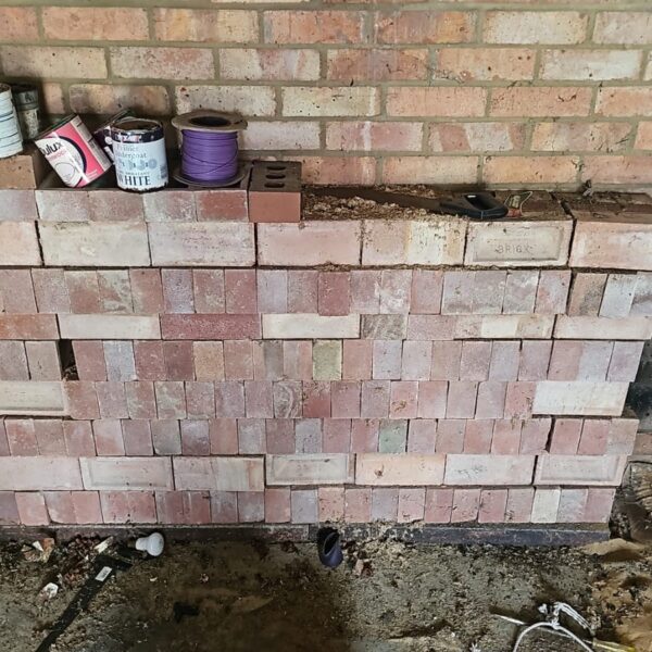 Lot of approximately 275 reclaimed building bricks for garden and DIY projects.
