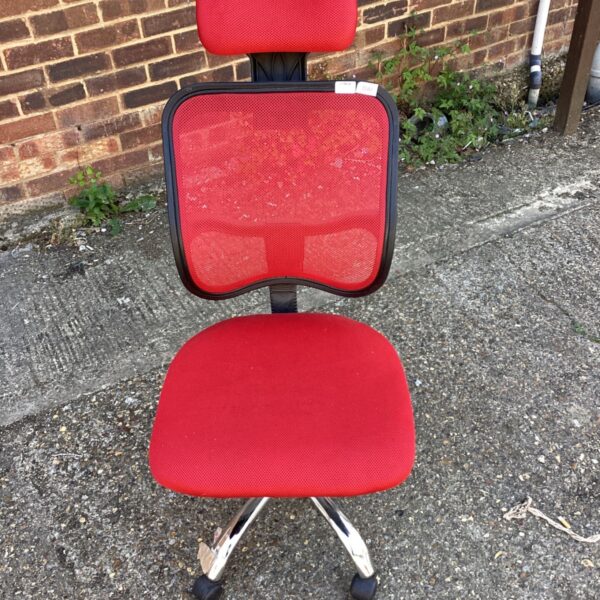 Red mesh ergonomic office chair with headrest and swivel base.