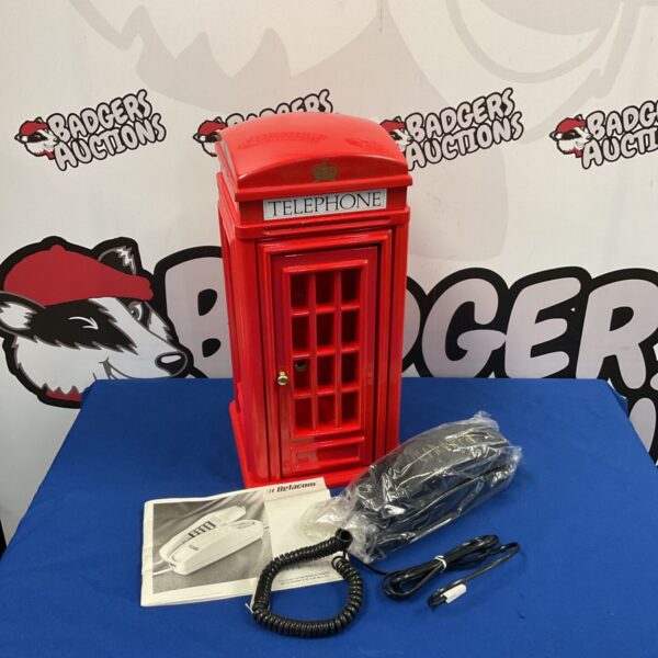 Red telephone box cabinet with Betacom III vintage home phone.