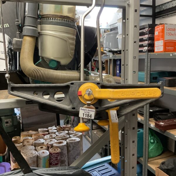 Yellow Rhino SafeClamp ladder clamp for secure work at height.