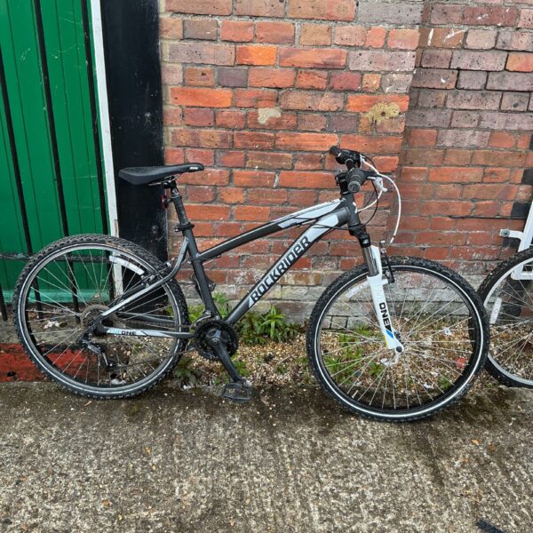 Used Rockrider Five One mountain bike in outdoor setting.