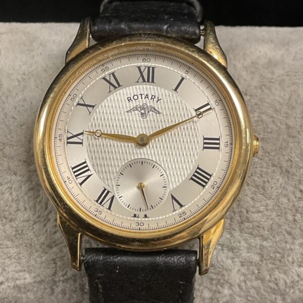 Vintage Rotary quartz wristwatch with gold case and leather strap.