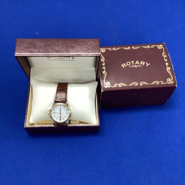 Vintage Rotary wrist watch displayed in its original box.