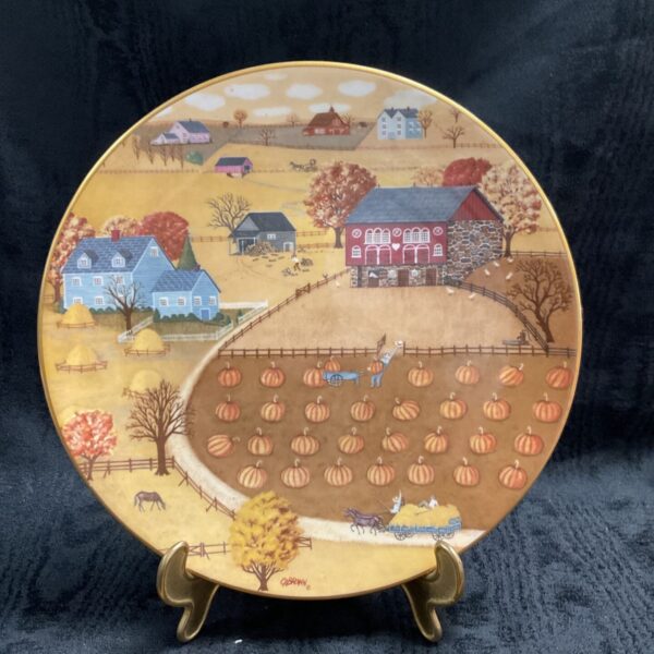 Royal Doulton pumpkin patch plate with autumn scene and farmhouse details.