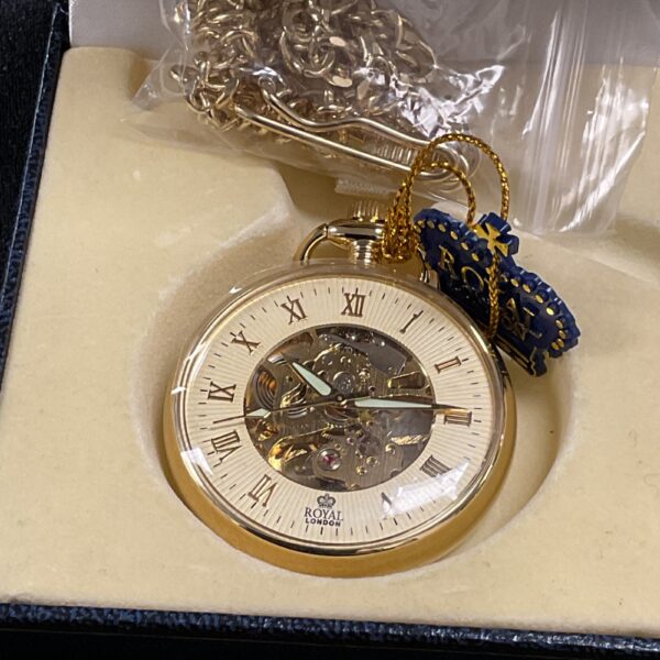 Vintage Royal London mechanical pocket watch with ornate chain.