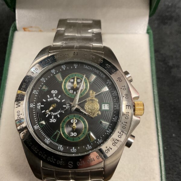 Detailed Royal Marines Commando wristwatch with blue dial.